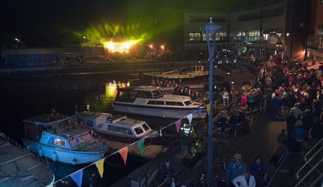 Image from Kirkintilloch Canal Festival - Marina with boats and stage at night