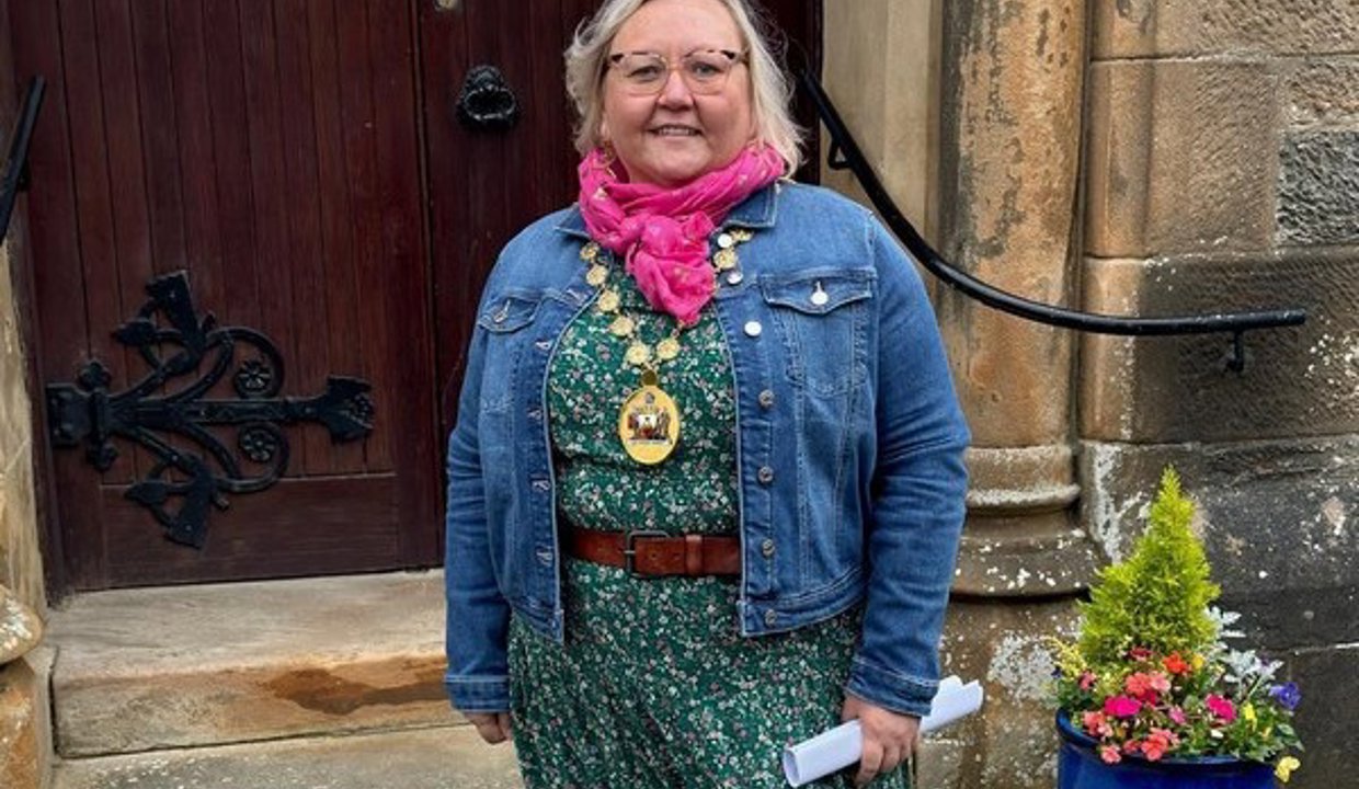 Provost Renwick outside Lenzie Old Parish Church