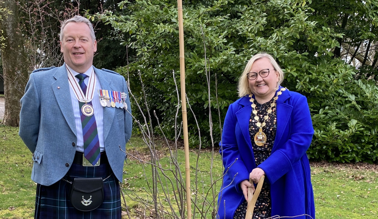 Provost and Deputy Lord Lieutenant Mike Edwards planting tree