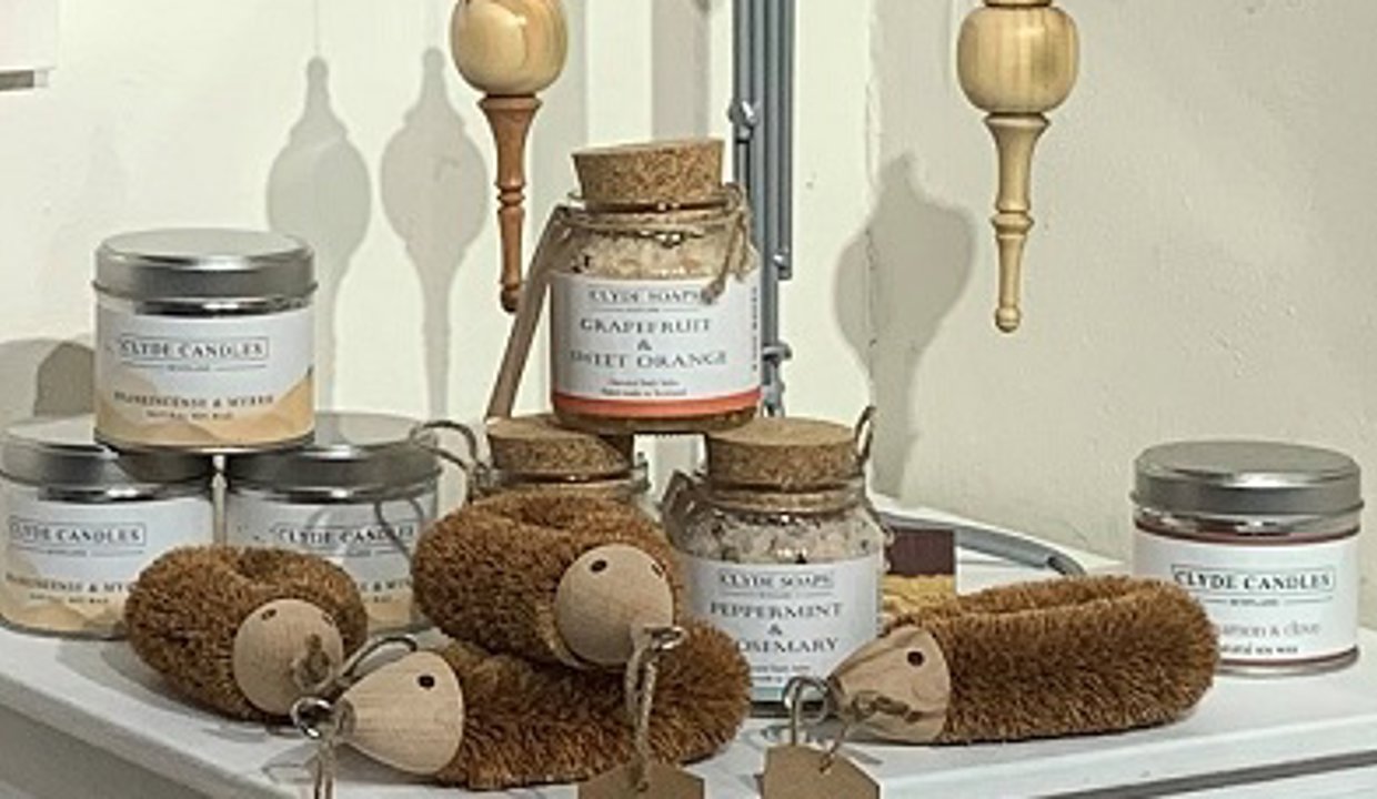metal tree haning ornaments and hand made hedgehogs made of wood