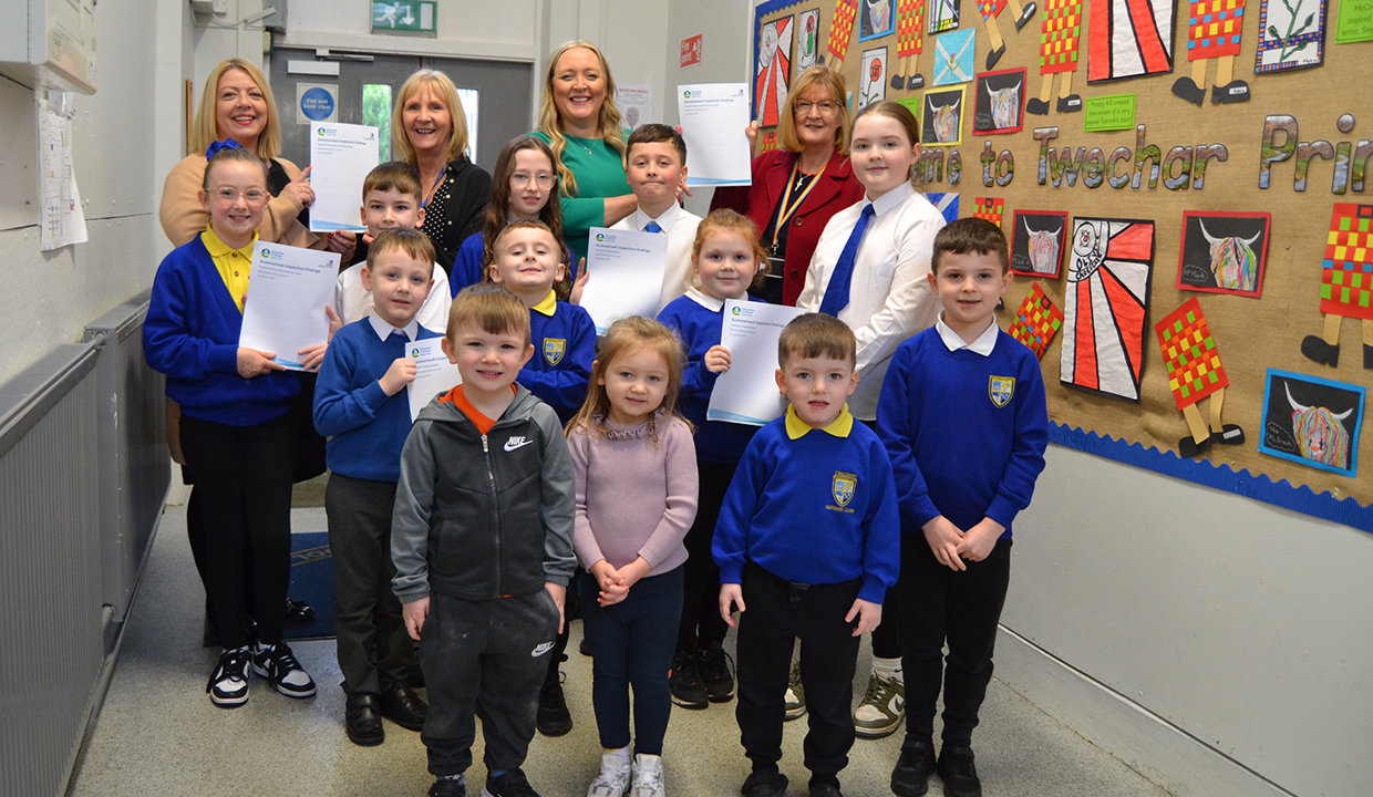 Linda Stewart, Acting Depute Head; Tracy Dodds, Depute Head of Centre; Headteacher Marie-Louise Brogan and Councillor Williamson with copies of their inspection report.