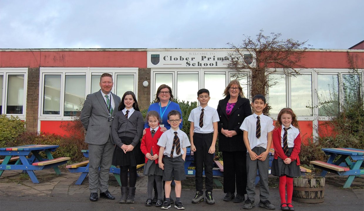 From left to right: Chief Education Officer, Greg Bremner, Headteacher Catrion Marshall and Councillor Lynda Williamson with some pupils from Clober PS