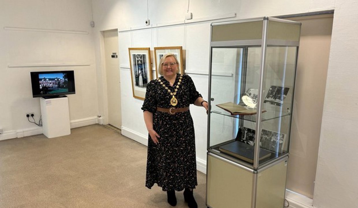 Provost Renwick with the exhibits in the Lillie Art Gallery