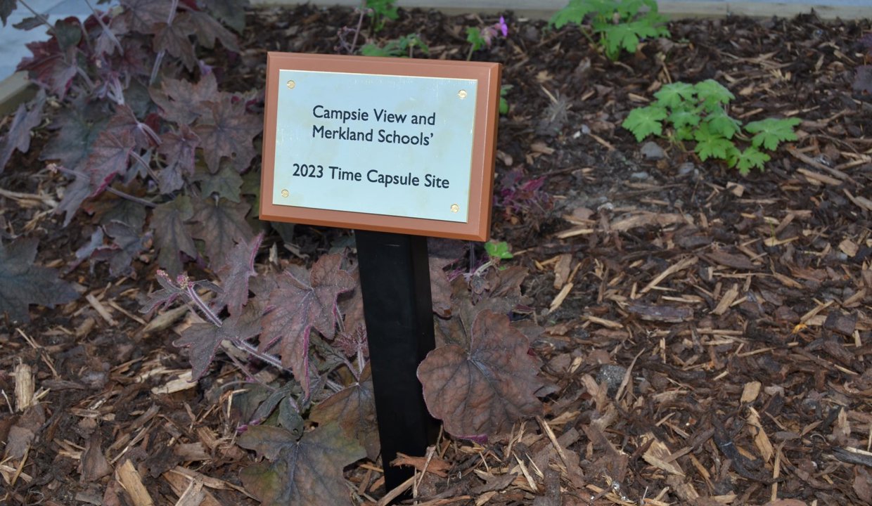 Campsie View and Merkland Time Capsule site plaque planted in the ground