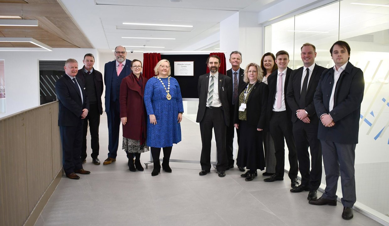 Provost Renwick is pictured at the Allander with representatives of the Council, EDLC Trust, HSCP and contractors.