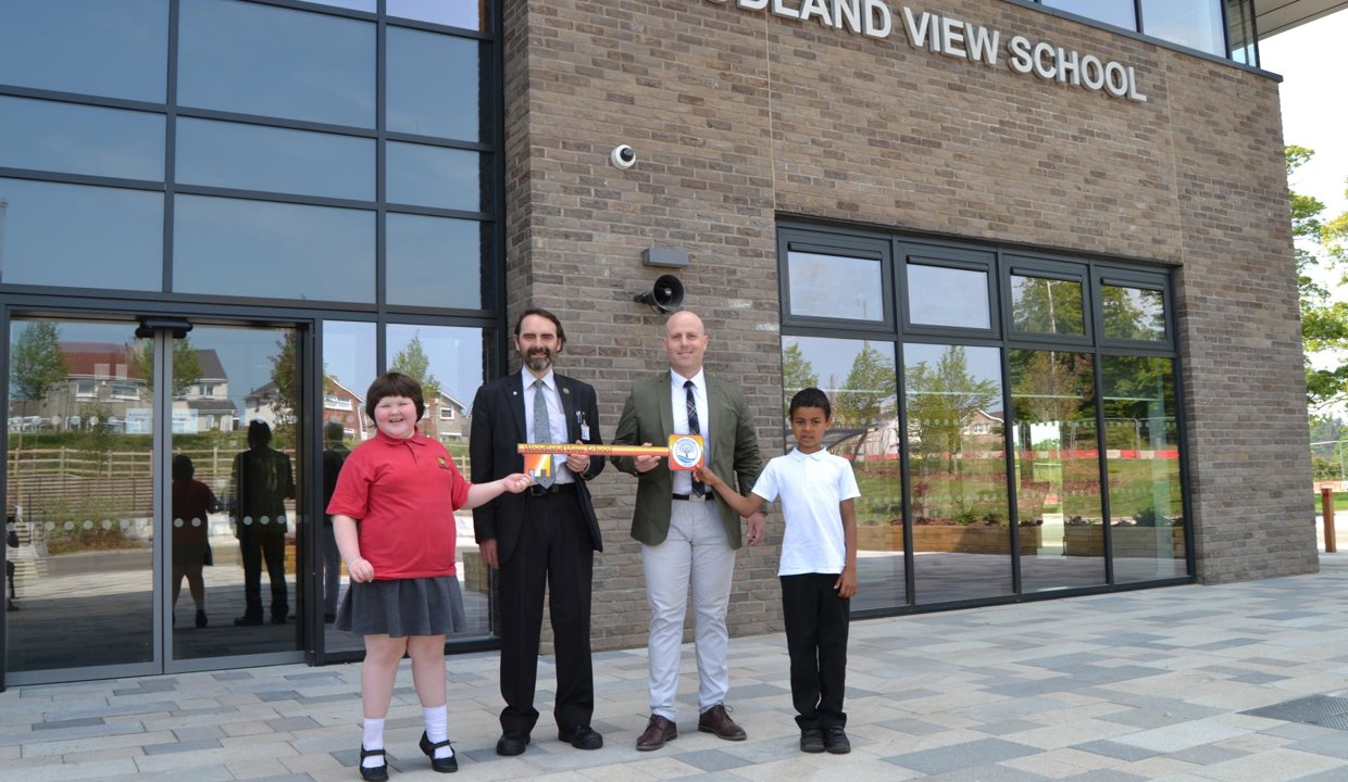 Pupils with Councillor Gordan Low and Project Manager, Gary McLeary