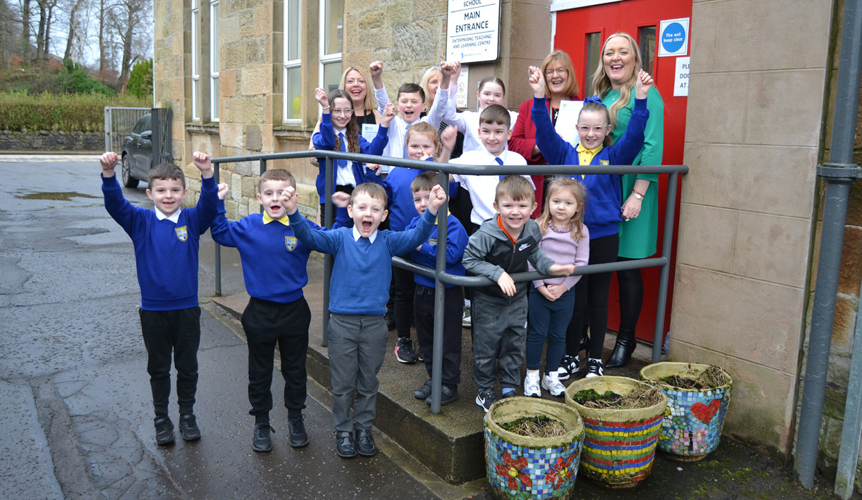 Linda Stewart, Acting Depute Head; Tracy Dodds, Depute Head of Centre; Councillor Williamson and Headteacher Marie-Louise Brogan celebrate with the children.