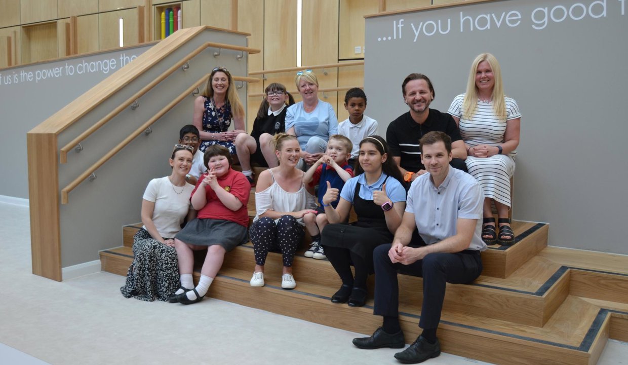 Head teacher Kay Hunter with staff and pupils.